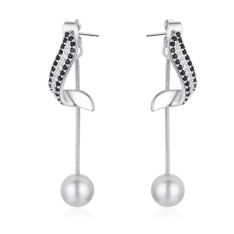 Special Interest Light Luxury High-grade Tassel Earrings with black and white stones, silver-tone finish, and pearl pendants for women.