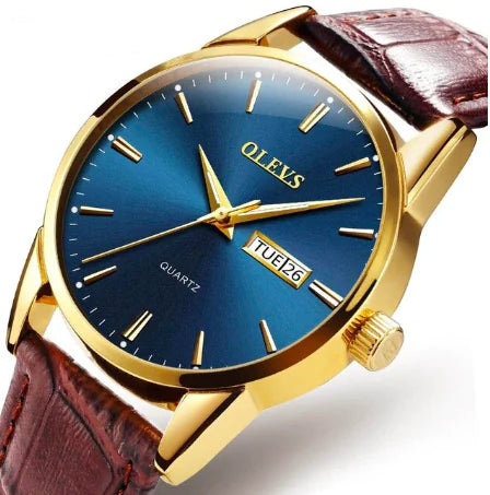 Elegant Quartz Couple Watch - Men's Mechanical Dual Calendar with blue dial, gold case, and brown leather strap for timeless appeal.