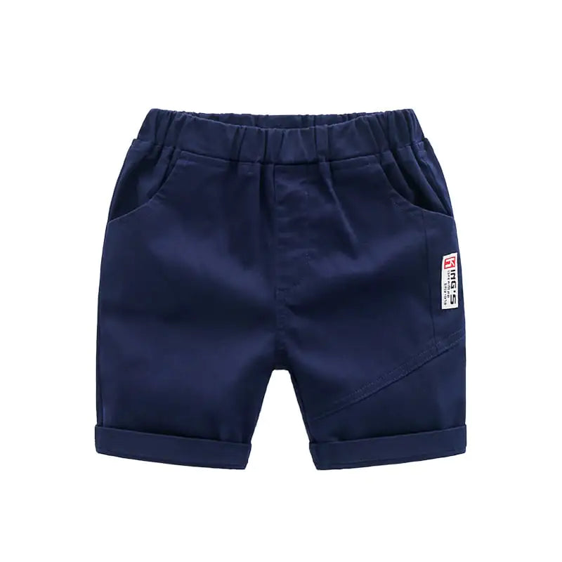 Dark navy blue kids' casual summer shorts with rolled cuffs and side pockets, ideal for playful summer days.