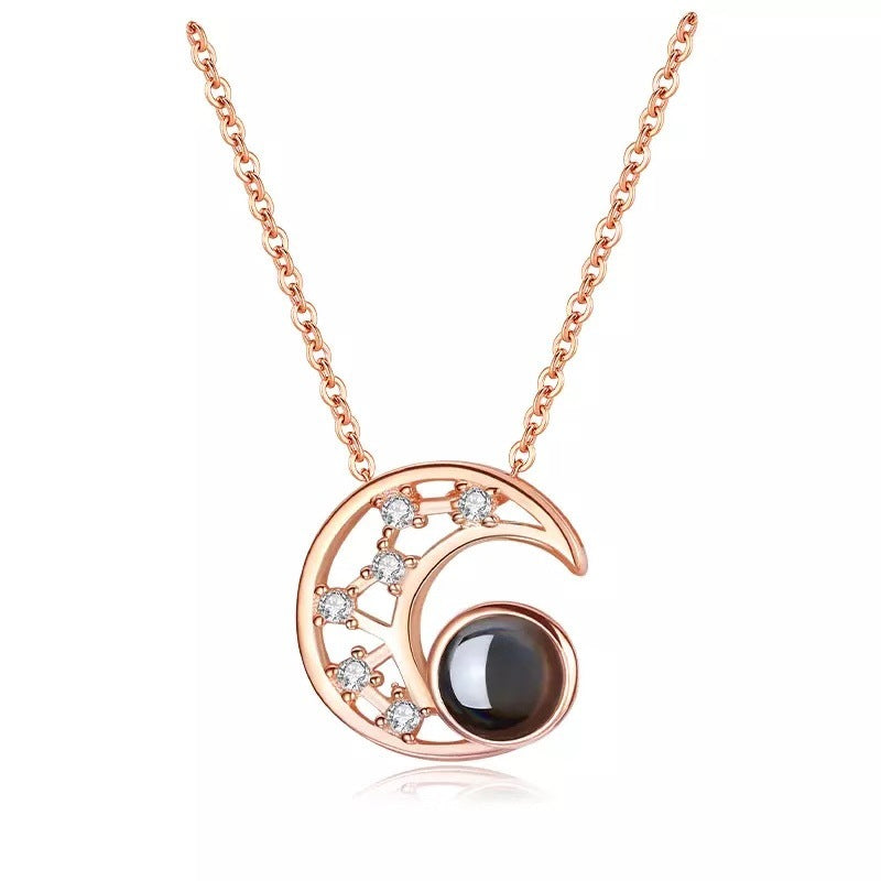 Necklace with Star and Moon Projection Design