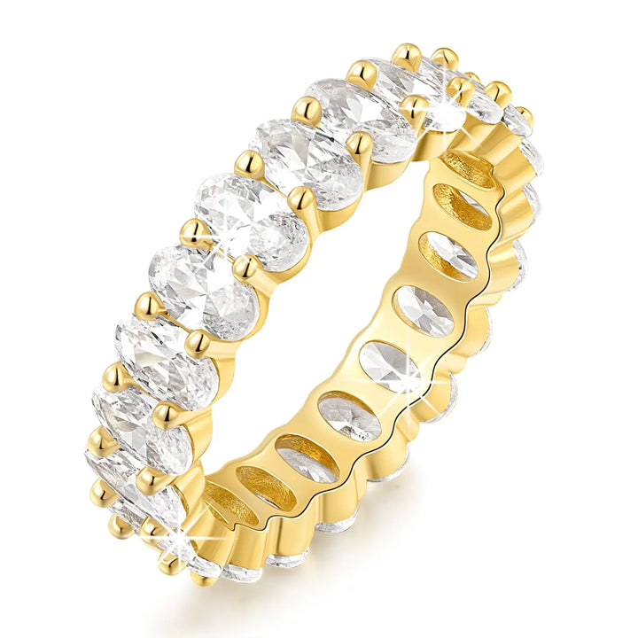 Elegant MIA MOUNE 14K gold stackable ring featuring oval cubic zirconia for timeless sparkle, ideal for weddings or daily wear.