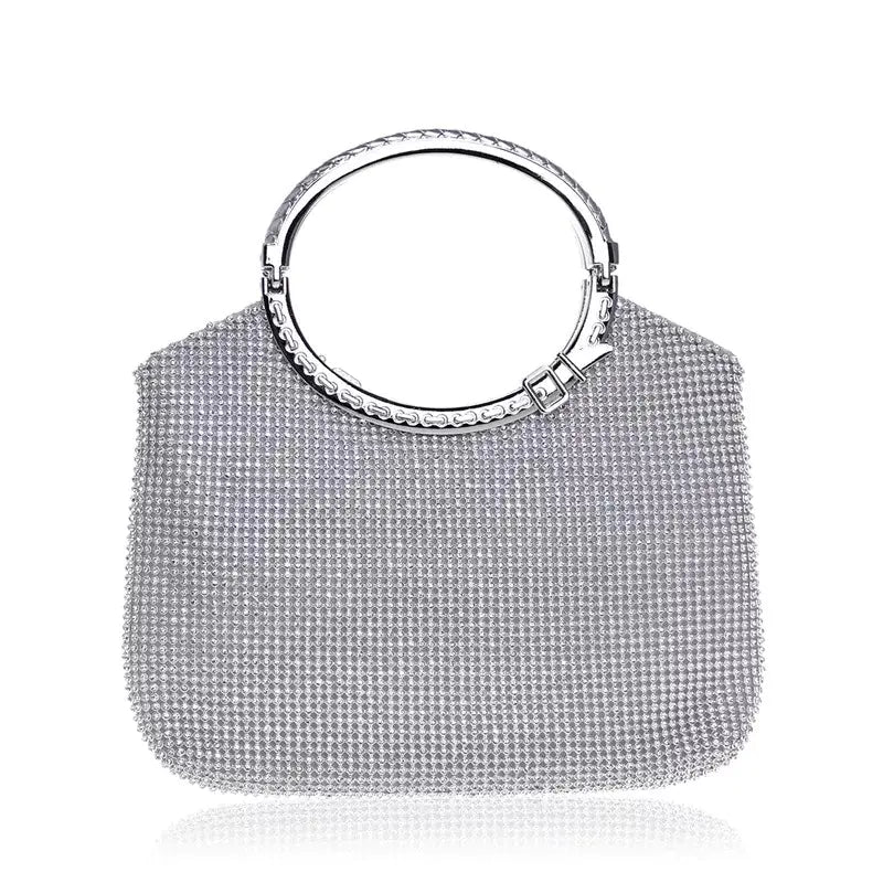 Chic silver banquet handbag for women with shimmering crystals and a stylish round handle, designed for upscale evening wear.